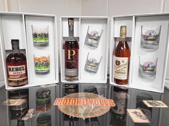 Compilation of booze bottles and glasses- custom designed packaging for distillers