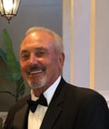 Black tie Bill Madl with innovative packaging, creative packaging,and custom packaging designer